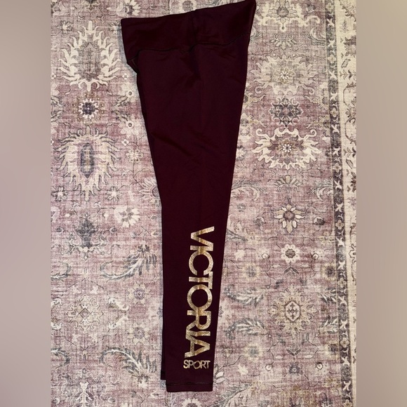 Victoria's Secret Sport Leggings in Deep Burgundy with Gold Lettering - Picture 1 of 4